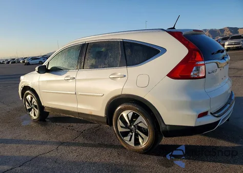 2015 Honda Cr-V Touring z USA, uszkodzony, nr VIN 5J6RM4H98FL096399